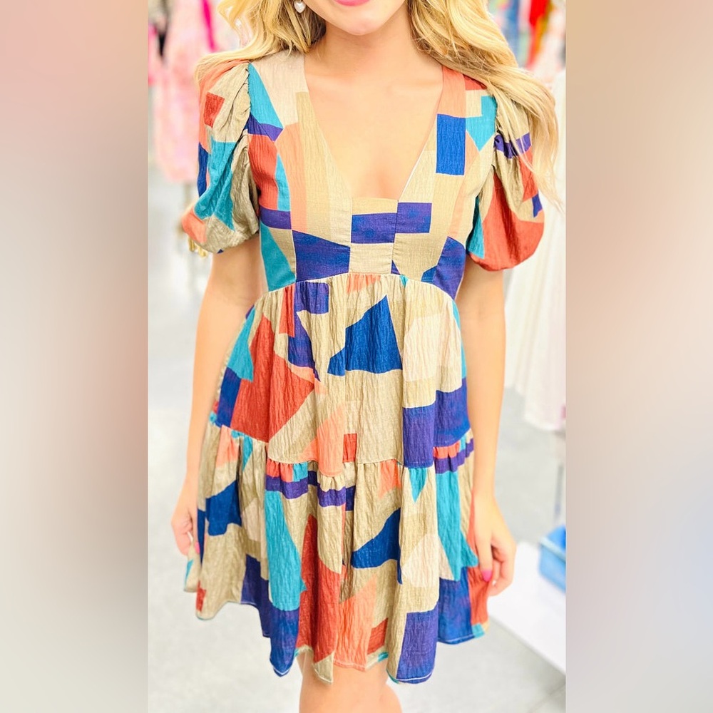 Shoe Fly Geometric Print dress in Blue, Purple, and Tan